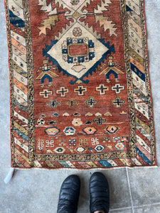 Farangis, NW Persian runner with two portraits, 2’4 x 7’2