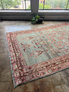 Babouna, antique Kurdish floral rug