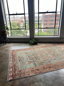 Babouna, antique Kurdish floral rug