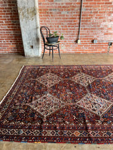 Load image into Gallery viewer, Chehrazar, Antique Khamseh tribal rug, 1920s, 6’9 x 9’10
